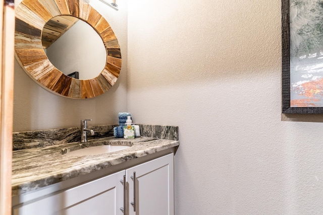 bathroom featuring oversized vanity