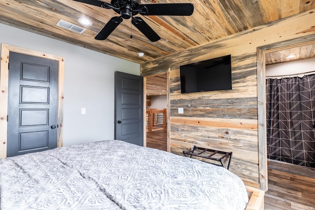 bedroom featuring wood ceiling, ceiling fan, and dark wood-type flooring