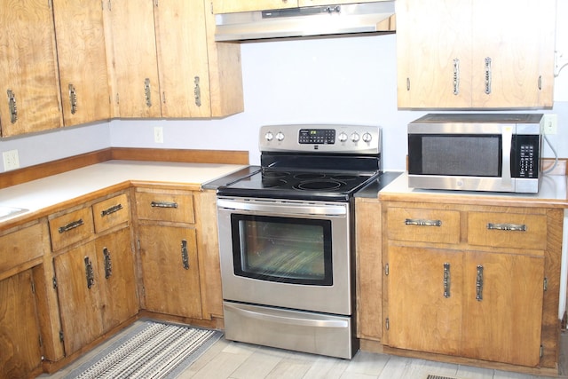 kitchen with appliances with stainless steel finishes