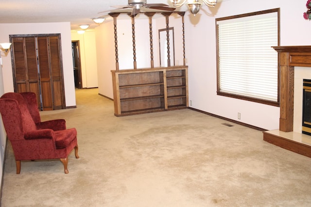 sitting room with light colored carpet