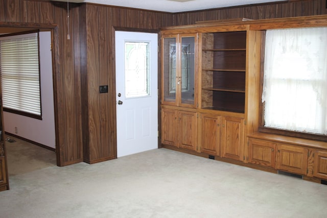 interior space featuring wood walls