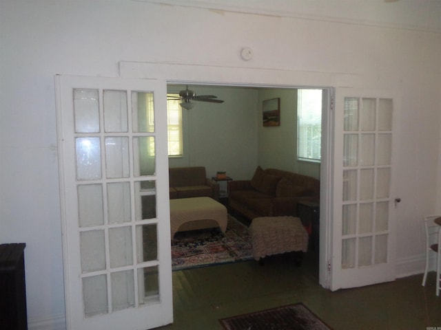 living area featuring ceiling fan