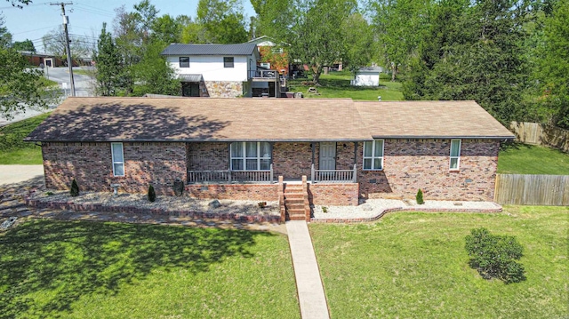 ranch-style house with a front lawn