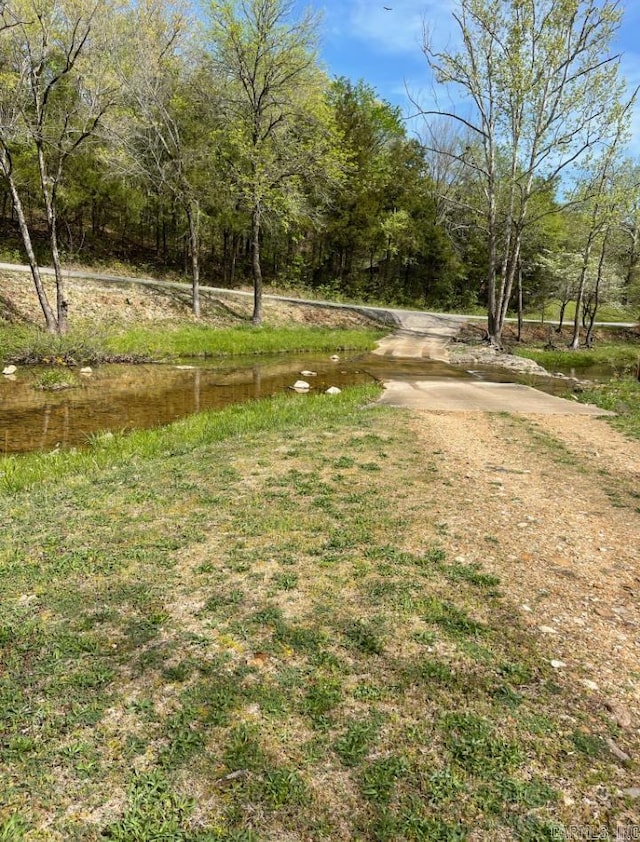 view of road featuring a water view