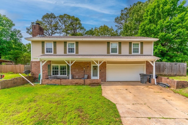 front facade featuring a front lawn, a garage, and a porch