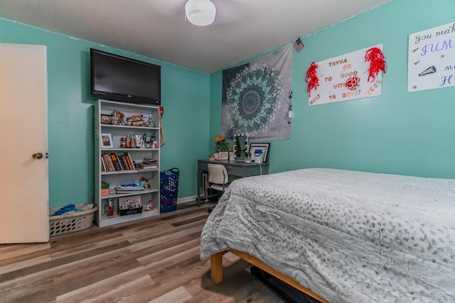 bedroom featuring hardwood / wood-style floors