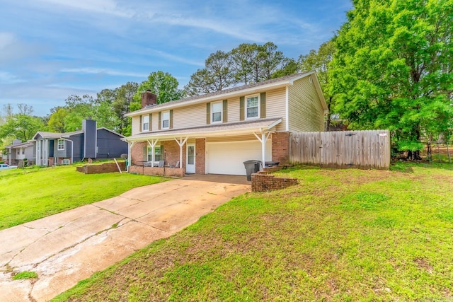 view of front of home featuring a garage and a front yard