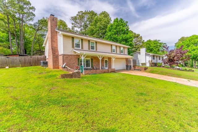 view of front of house featuring central AC unit and a front lawn