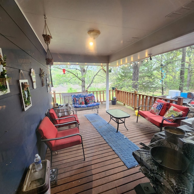 deck featuring an outdoor hangout area