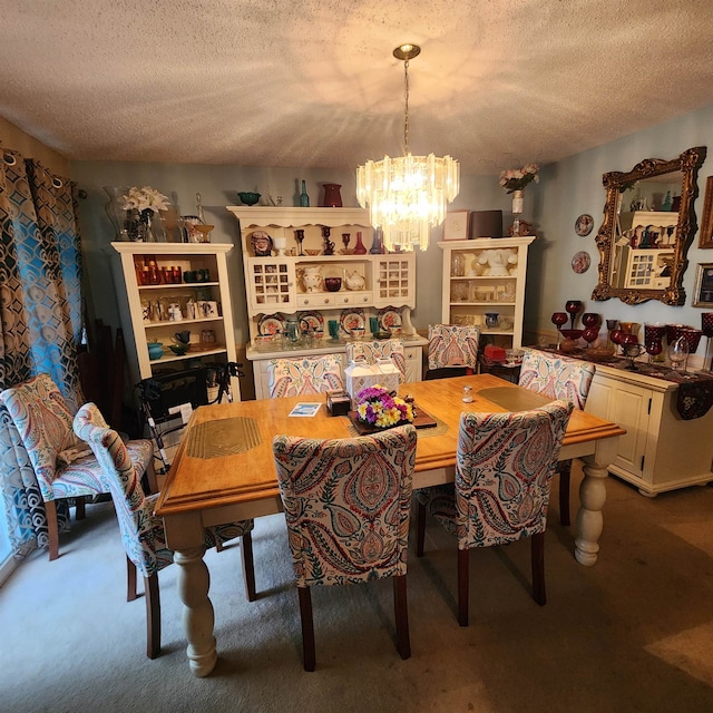 carpeted dining space with a textured ceiling and an inviting chandelier