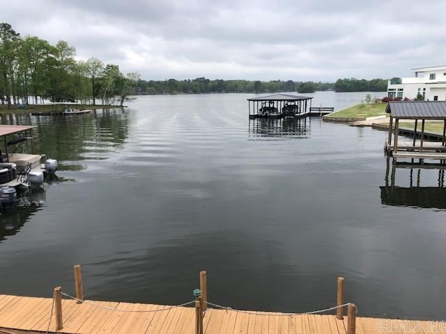 dock area featuring a water view