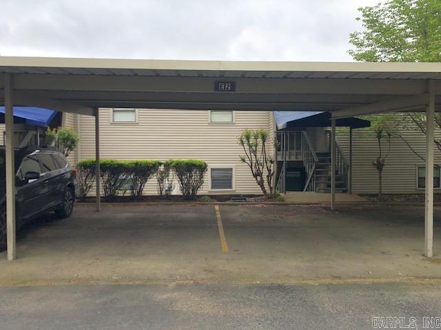 view of car parking featuring a carport