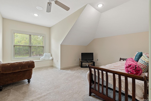 carpeted bedroom with lofted ceiling and ceiling fan