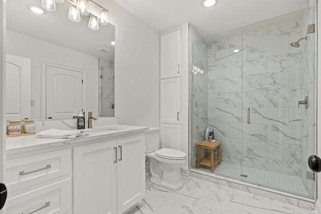 bathroom with a shower with shower door, vanity, toilet, and tile flooring