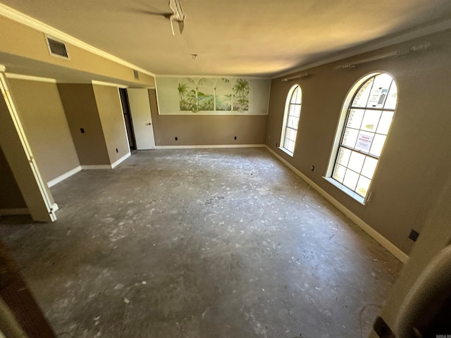 spare room with concrete flooring