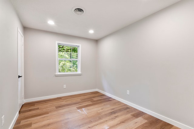 unfurnished room featuring light wood-type flooring