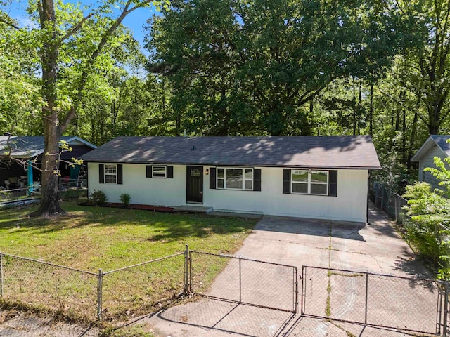 ranch-style home with a front lawn