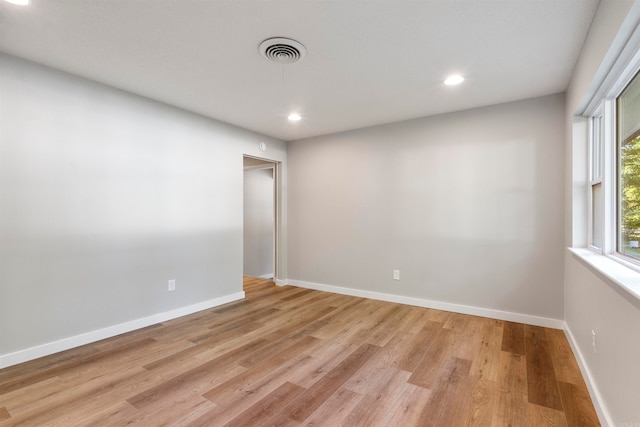 empty room featuring light hardwood / wood-style floors