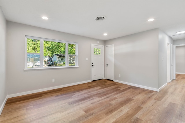 foyer featuring a healthy amount of sunlight and light wood-type flooring