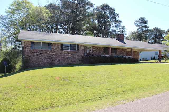 ranch-style home with a front lawn