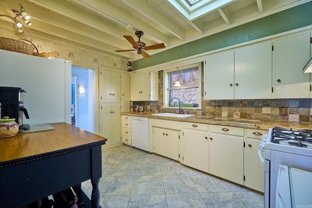 kitchen featuring white appliances, backsplash, light tile floors, sink, and ceiling fan