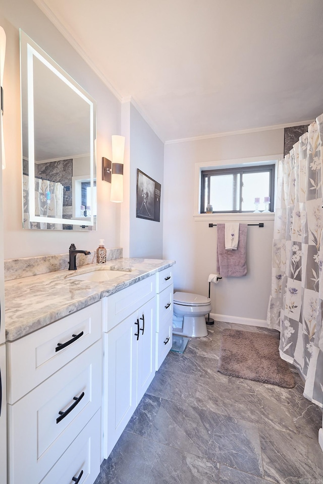 bathroom featuring ornamental molding, toilet, tile floors, and vanity