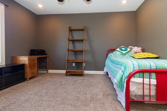 carpeted bedroom featuring ceiling fan