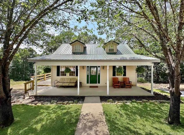 view of front of home with a front yard