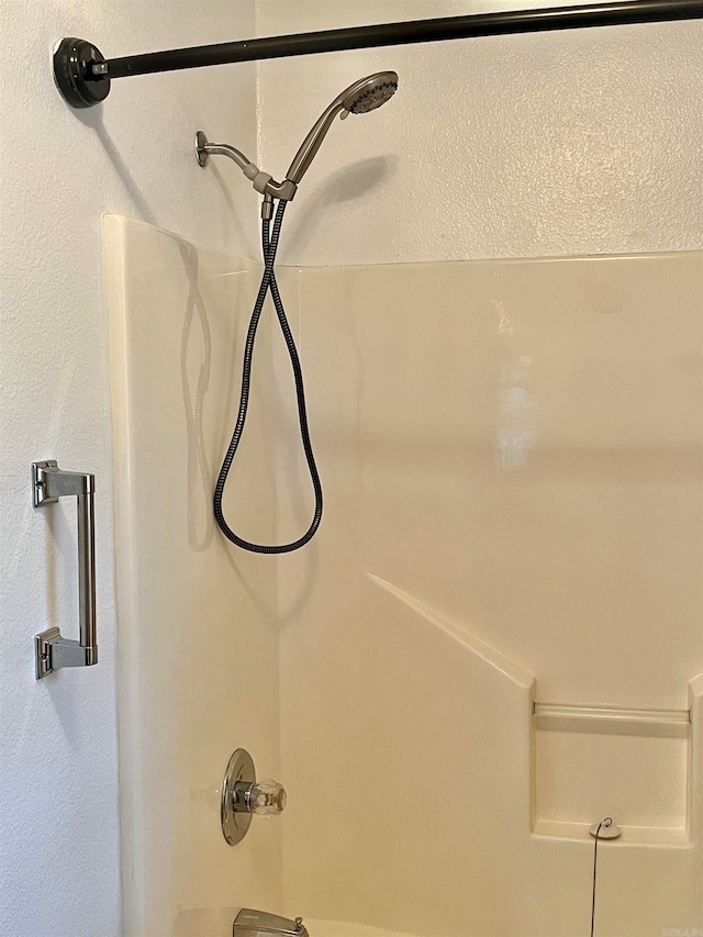 details with shower / bathtub combination