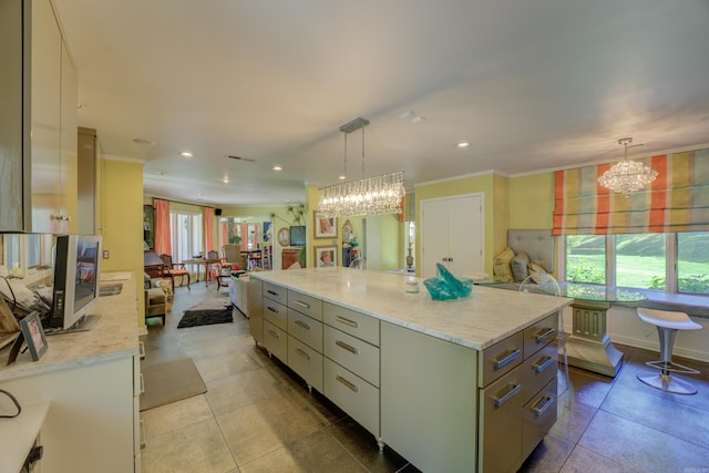 kitchen featuring decorative light fixtures, light stone countertops, light tile floors, a notable chandelier, and a kitchen island