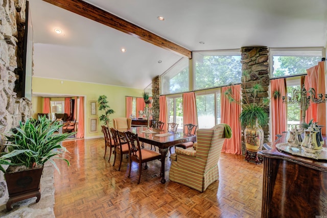 dining area with beamed ceiling, plenty of natural light, high vaulted ceiling, and parquet floors