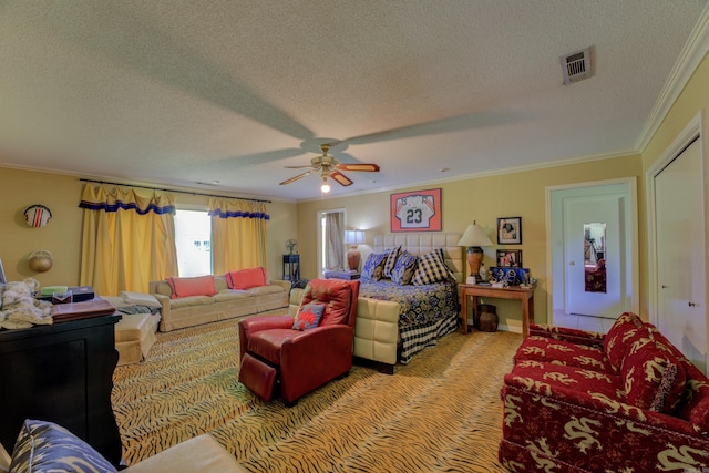 carpeted living room featuring a textured ceiling, ceiling fan, and crown molding