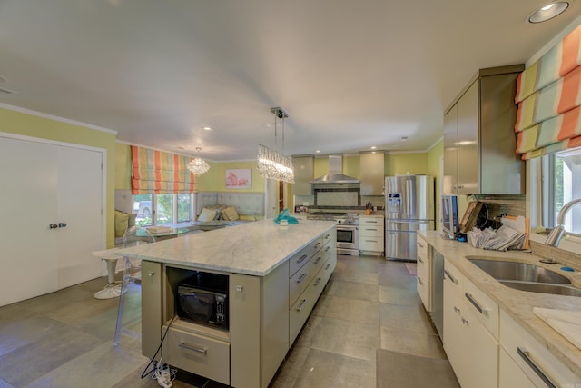 kitchen featuring light tile flooring, a healthy amount of sunlight, wall chimney exhaust hood, and stainless steel appliances