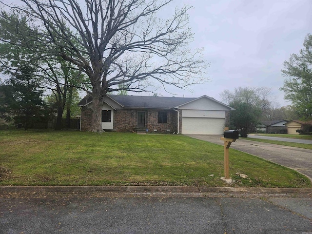 ranch-style house with a garage and a front lawn