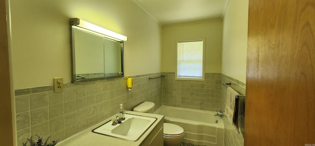 bathroom featuring tile walls, oversized vanity, a bathing tub, toilet, and tasteful backsplash