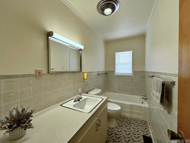 bathroom featuring tile walls, oversized vanity, toilet, tile flooring, and tasteful backsplash