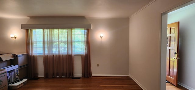 living room featuring crown molding and hardwood / wood-style flooring