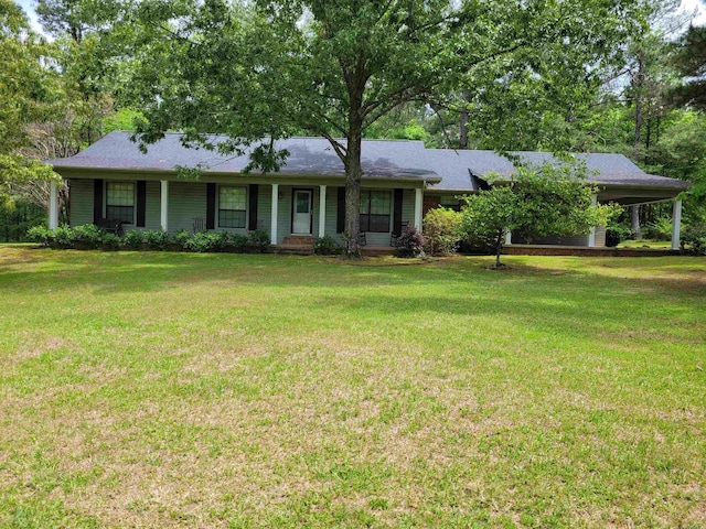 single story home featuring a front lawn