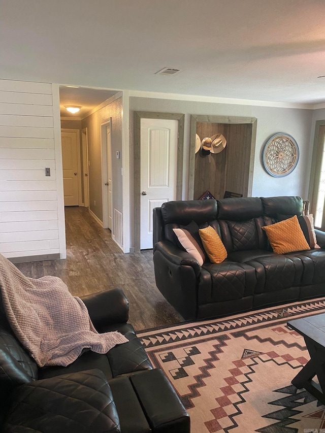 living room featuring dark hardwood / wood-style flooring