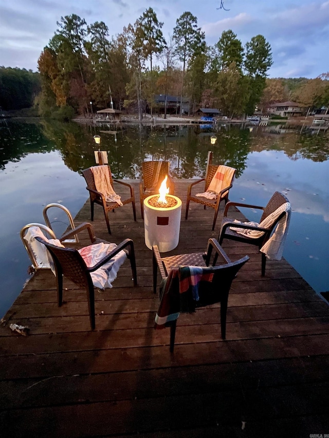 dock area with a water view