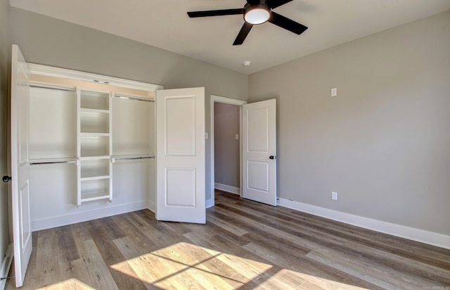 unfurnished bedroom with a closet, ceiling fan, and light hardwood / wood-style flooring