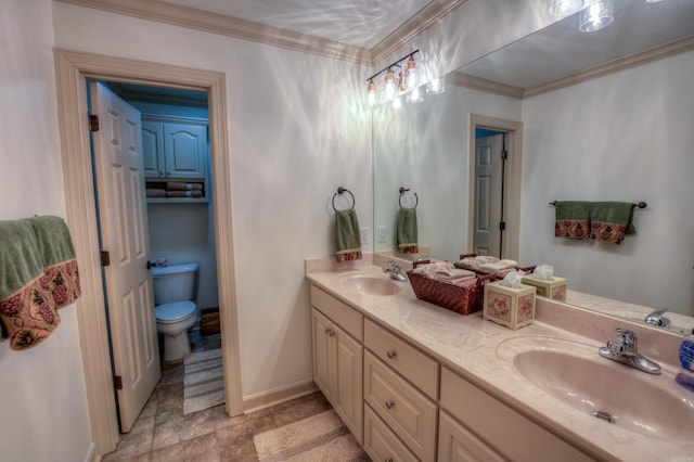 bathroom featuring ornamental molding, dual bowl vanity, toilet, and tile flooring