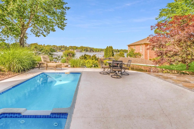 view of pool with a patio area