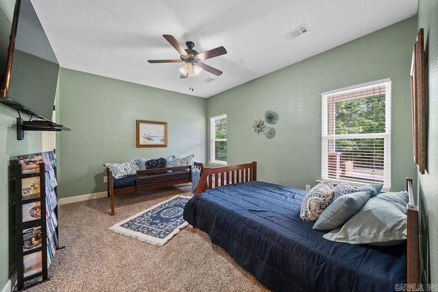 bedroom with ceiling fan and carpet