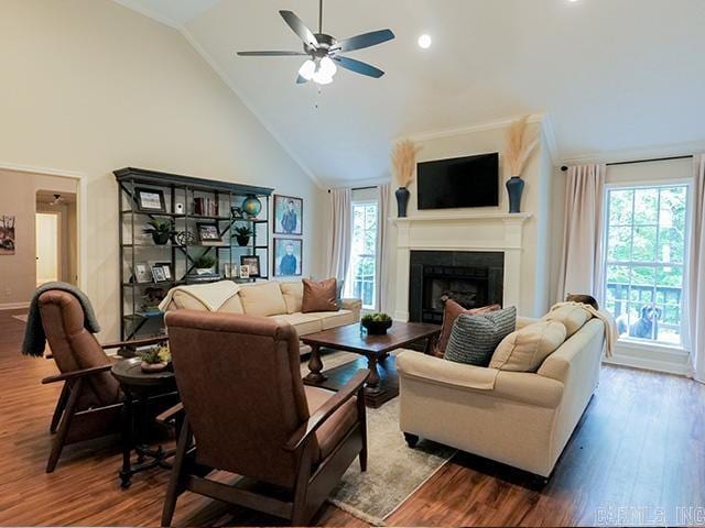 living room with high vaulted ceiling, wood-type flooring, and ceiling fan