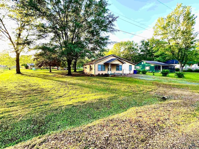 exterior space featuring a front yard