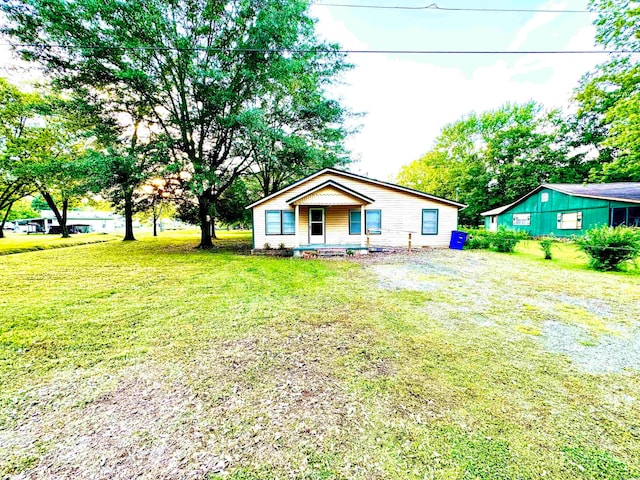 exterior space with a front lawn