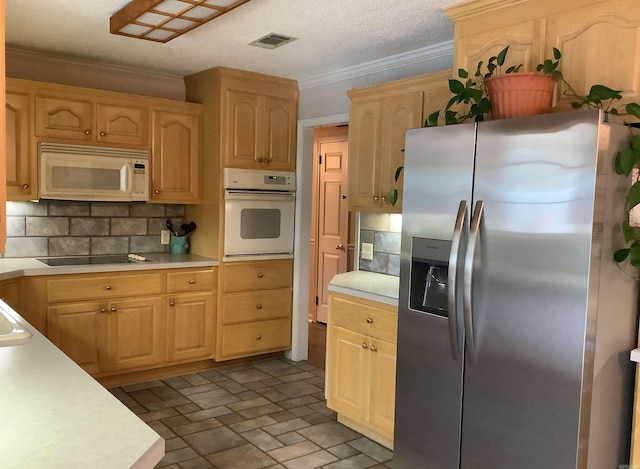 kitchen featuring light brown cabinets, white appliances, light tile flooring, backsplash, and ornamental molding