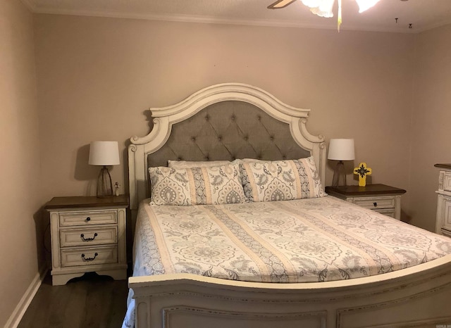 bedroom featuring hardwood / wood-style floors and ceiling fan