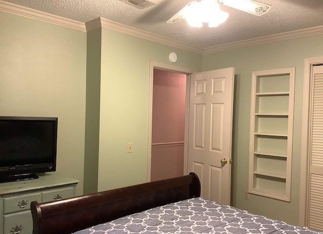 unfurnished bedroom featuring a closet, a textured ceiling, ceiling fan, and ornamental molding